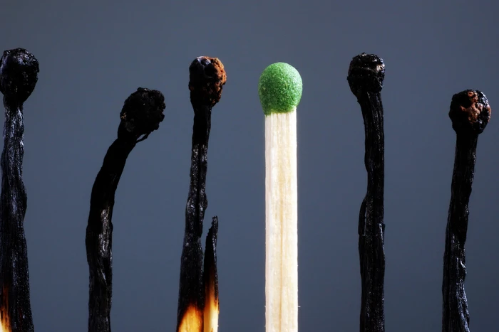 Photo of a set of matches with all burnt out but one.