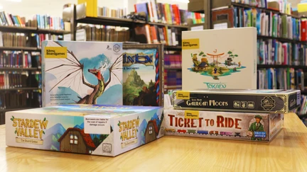 A selection of boardgames on a table top
