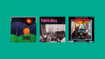 Some CD covers from this list on a teal background.