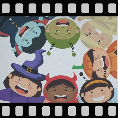 A film negative style border around an image of seven people wearing costumes and grinning