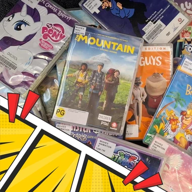 A stack of children's DVDs with a comic exclamation border