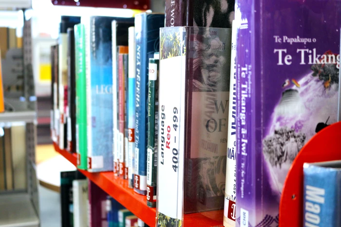 Photo of a shelf of books from our Māori collection