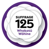 Suffrage 125 symbol. A white camelia with "Suffrage 125 Whakatū Wahine" written in the centre, inset on a purple circle background.