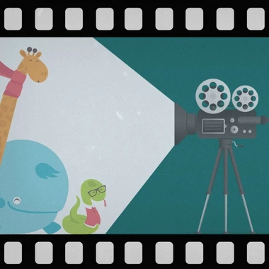 A film negative style border around an image of a film camera pointing at a group of three animals
